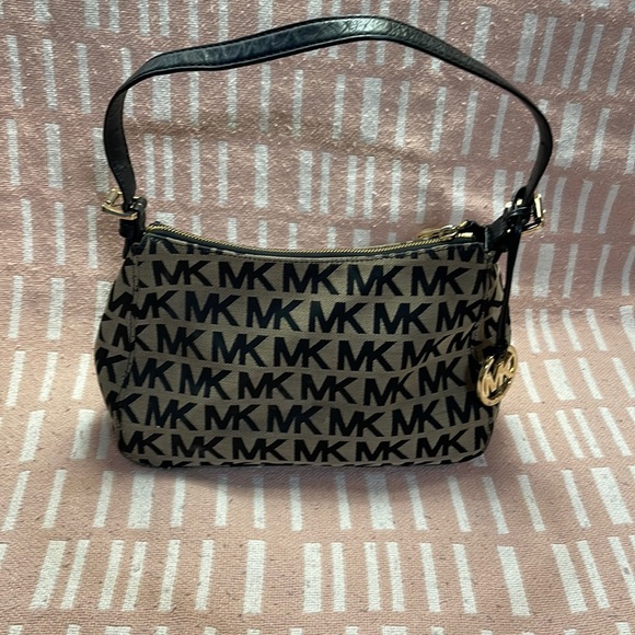 Michael Kors Handbags - MK bag black/tan smaller CUTE ☺️